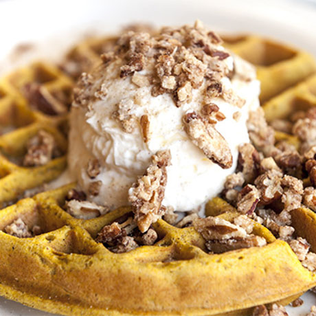 waffle with whipped cream and pecans